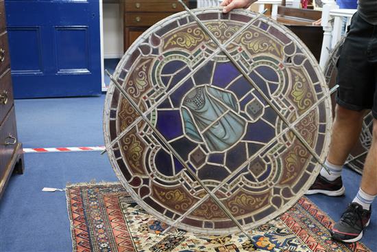 A set of eleven 19th century stained glass roundels, diameter 24in.